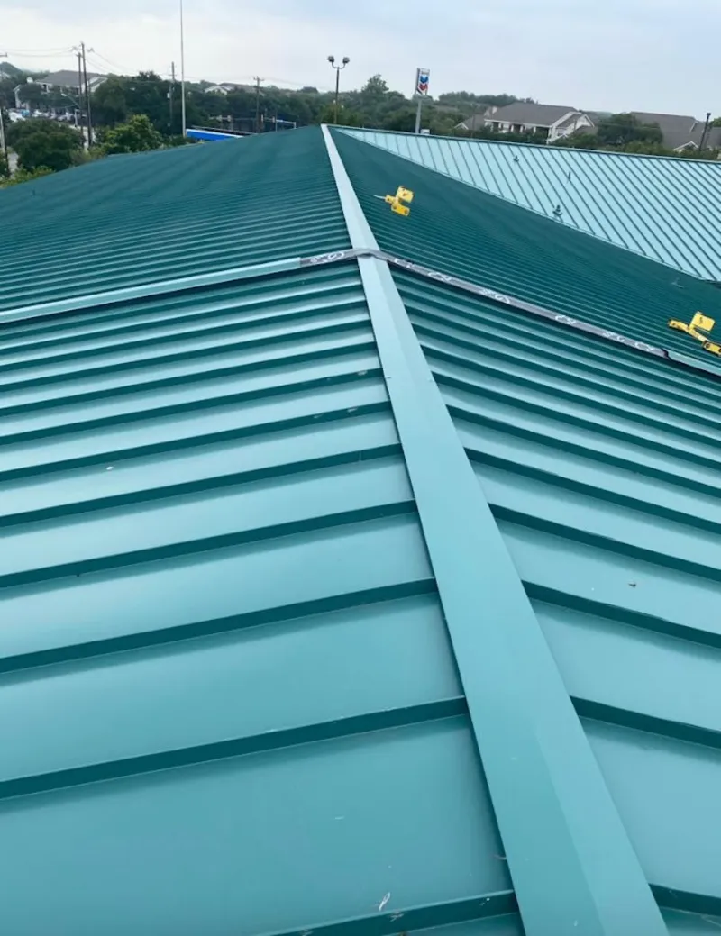 Green commercial metal roof ridge and valley for Metal Roof Repair in Fort Carson