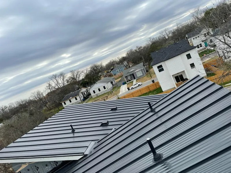 Standing seam metal roof panels with vents for Skylight Repair in Fort Carson
